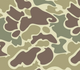 Camouflage pattern in brown, green, and beige colors
