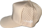 5 panel hat with snapback adjustability that is moisture wicking. Tan color, side view.
