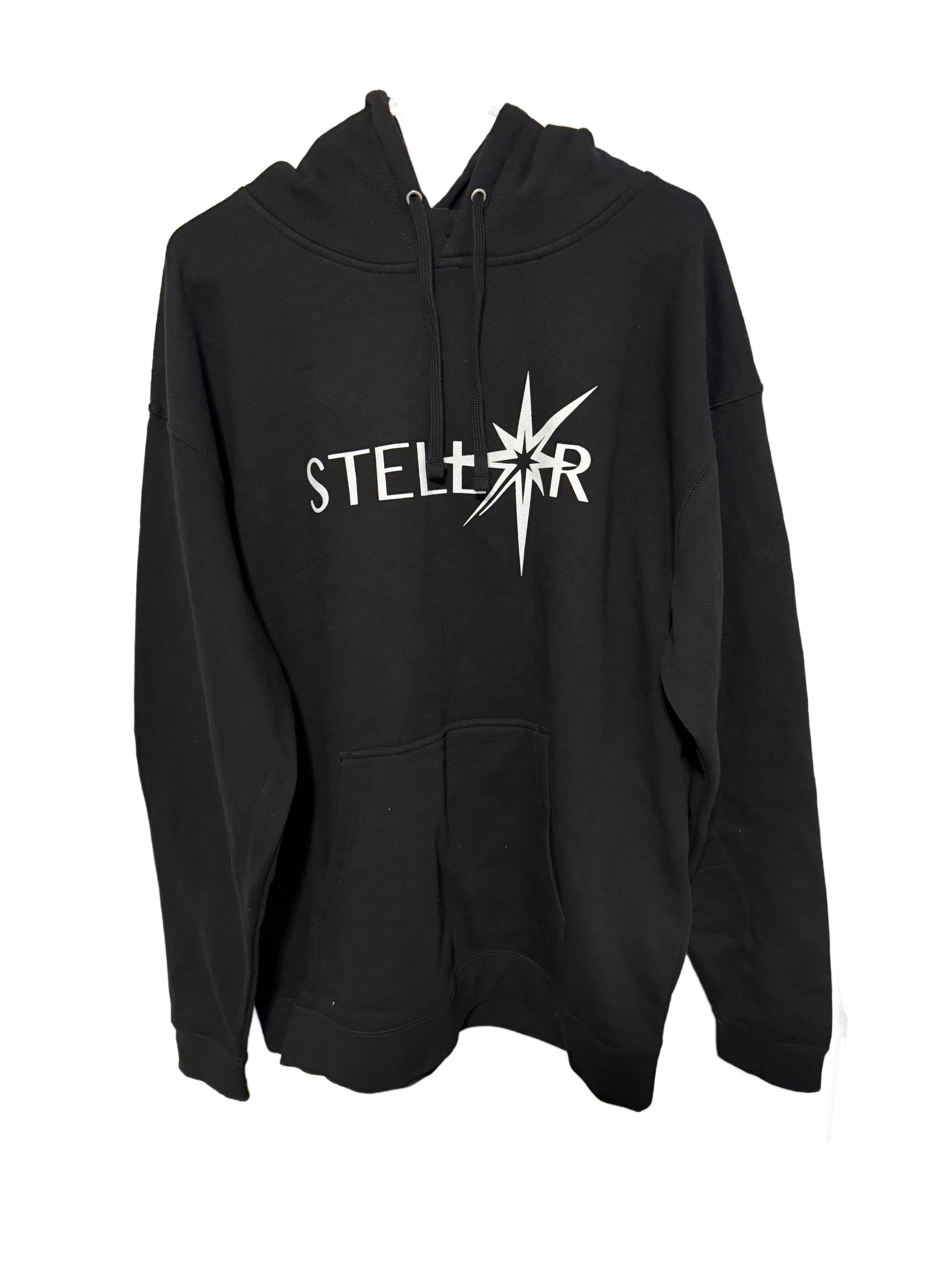 Stellar Hoodie hanging. Black color. Front of garment.