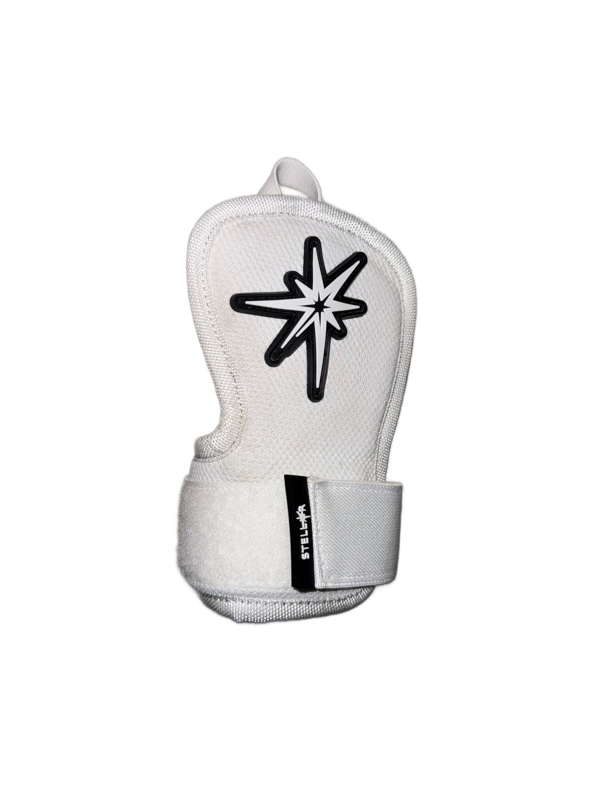 Stellar Hand Guard featuring a protective shell, adjustable strap, and ergonomic design for hitters.